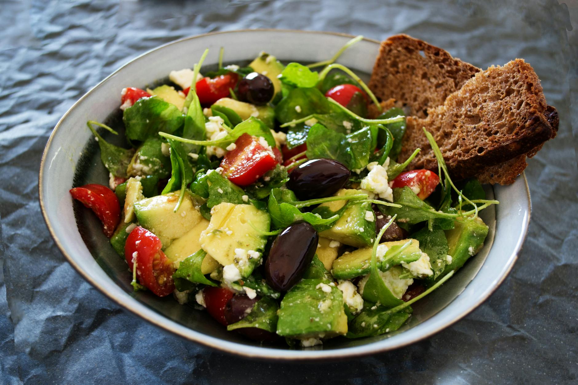 https://www.pexels.com/photo/vegetable-salad-with-wheat-bread-on-the-side-1213710/